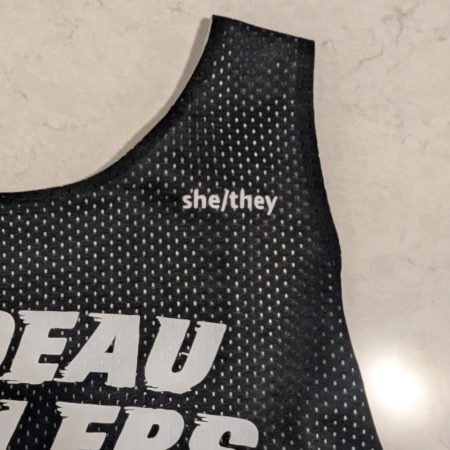 pronoun badge she/they